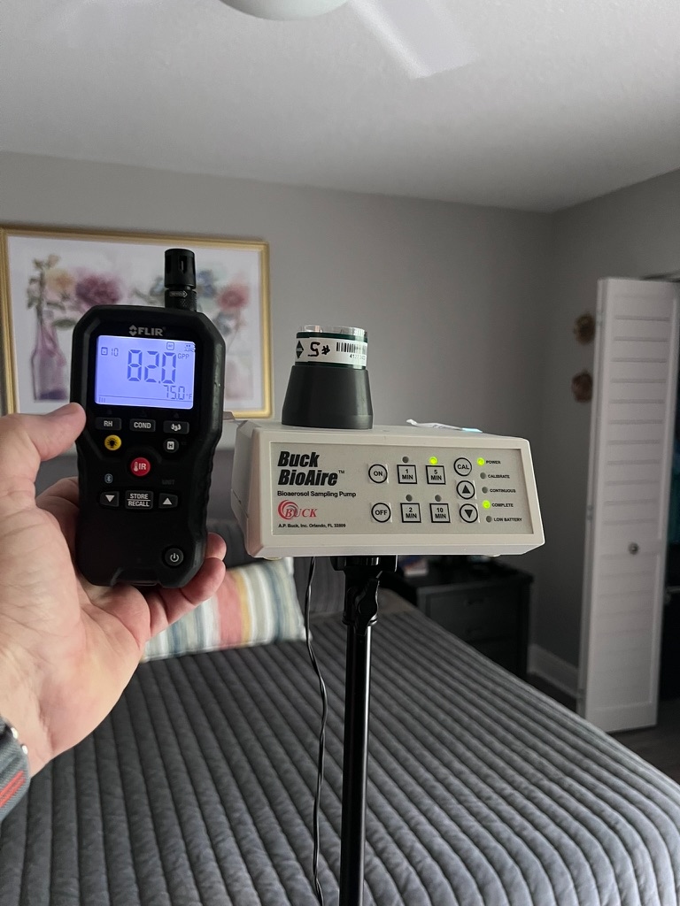Bioaerosol pump collecting air sample for lab analysis in Broward County, FL