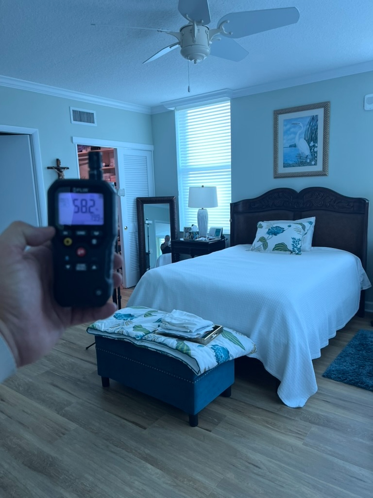 Thermal scan of bedroom wall showing moisture at 58 degrees in Kendall, FL